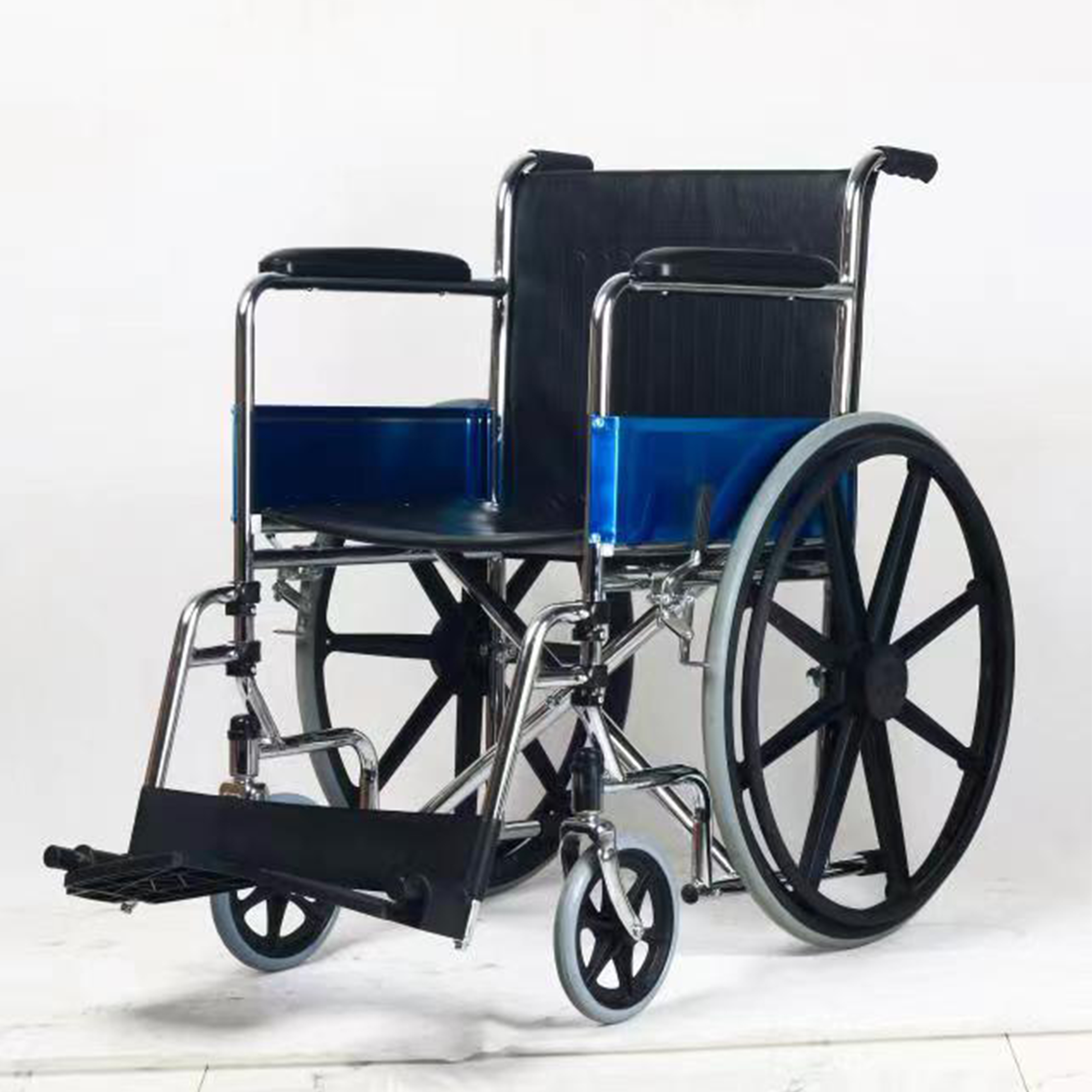 Manual folding wheelchair